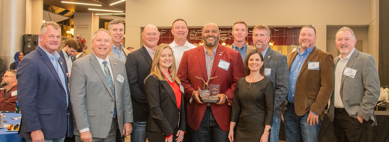 County leadership poses for a picture with Senator Corey Simon